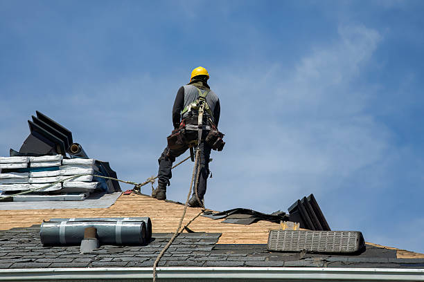 Professional Roofing technician working in Floral Park, NY
